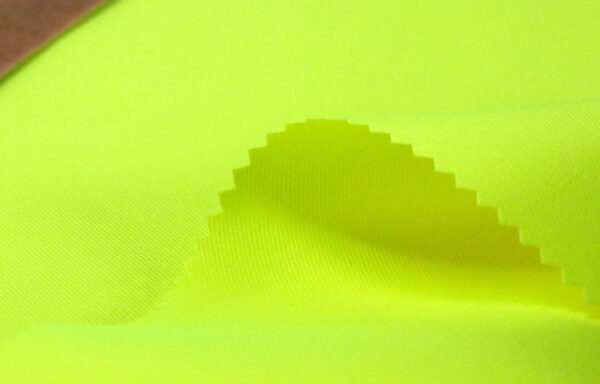Discover the Versatility of Fluorescent Polyester Twill Fabric