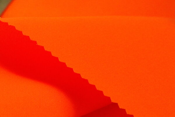 Illuminate Your Projects with Fluorescent Polyester Twill Fabric